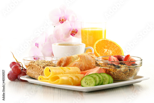 Breakfast with coffee, rolls, egg, orange juice, muesli and chee