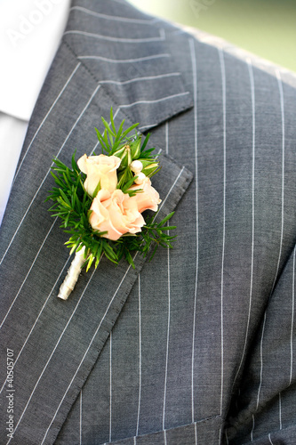 Beautiful wedding boutonniere at groom's costume