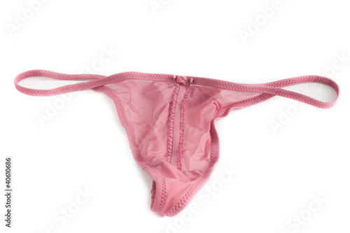 Woman's sexy and pink thong on white background