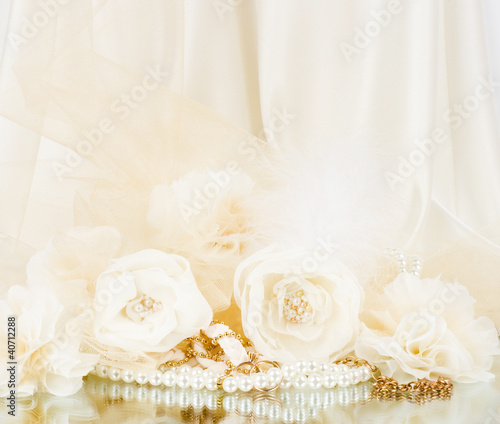 Vintage lace with flowers and beads on white background