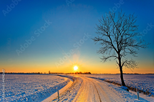 Sunset in a white winter landscape