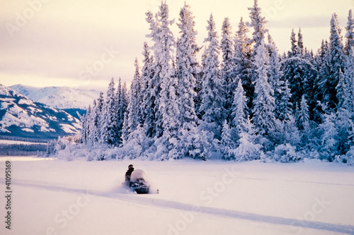 Winter snow sports on a snowmobile