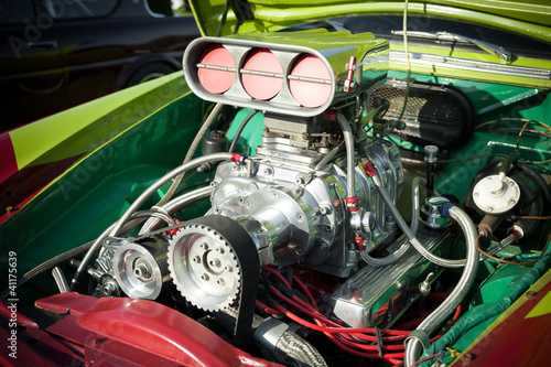 powerful supercharge blower inside a hot-rod engine bay