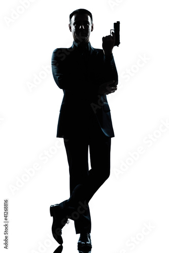 silhouette man full length secret agent in a james bond posture