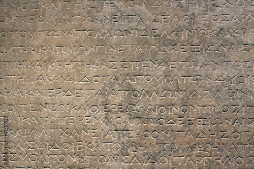 Ancient Greek Inscription on Stone Wall