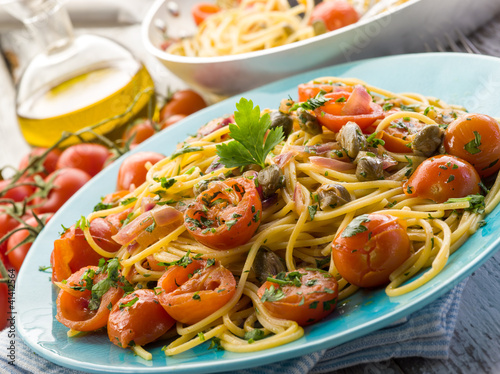 guitar spaghetti with pachino tomatoes and capers