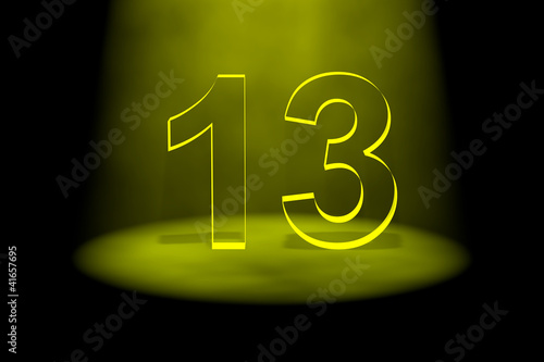 Number 13 illuminated with yellow light