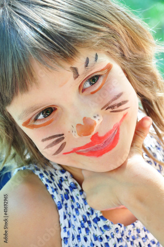 happy child with funny painted face