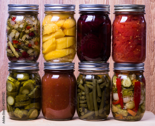 Group of fresh homemade preserved vegetables and fruits