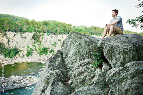 Young hiker on a cliff at Great Falls Park Virginia