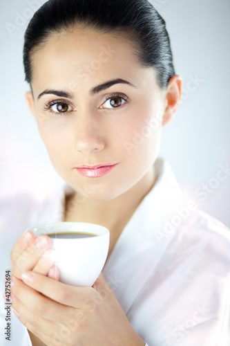 Beautiful Young Woman With White Cup of Coffee