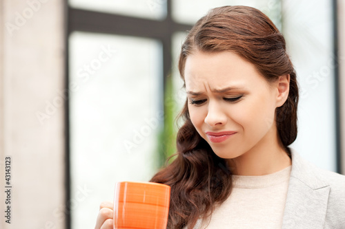 lovely businesswoman with mug