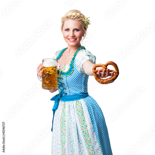 junge blonde Frau im Dirndl mit Masskrug und Brezn