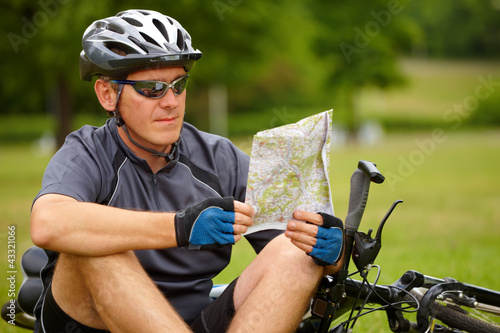 Biker with map