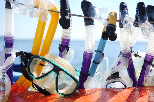 diving goggles with snorkel hanging affter used