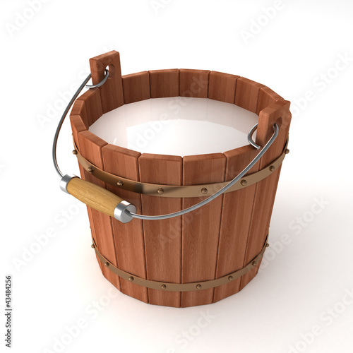 wooden bucket with milk on white background