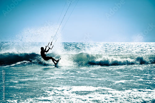 Kite surfing in waves.