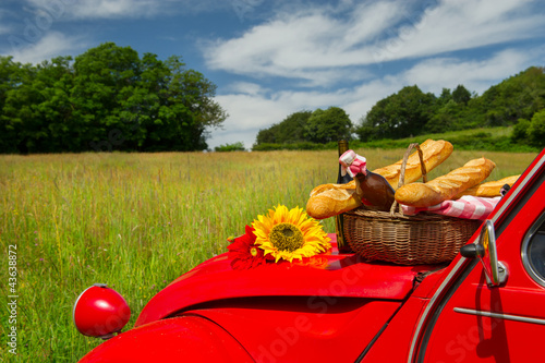 French car with bread and wine