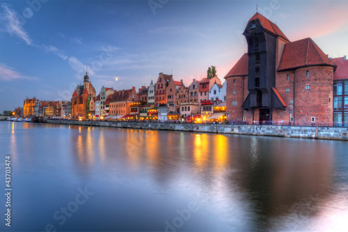 Old town of Gdansk with ancient crane at dusk, Poland