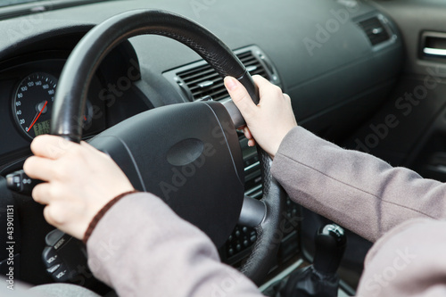 Right hands position on steering wheel during driving a vehicle