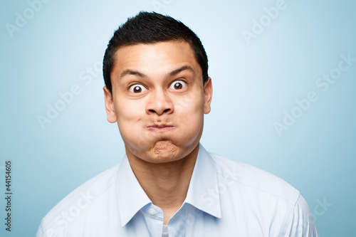 funny face young man close up portrait