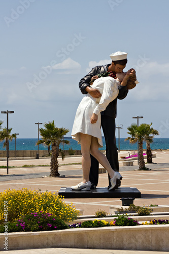 Seaman and girl on the pier