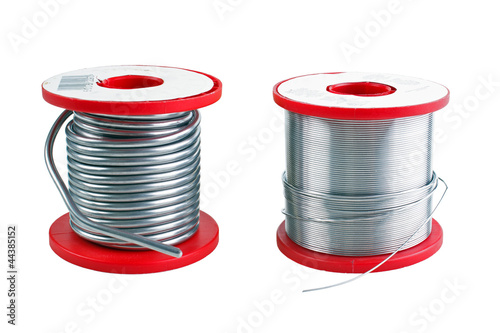 Two different size soldering tin spools