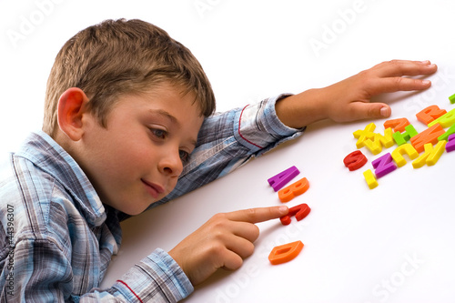 Boy learning letters