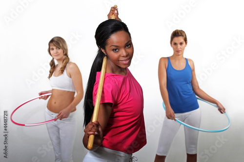 Women working out with hula-hoops