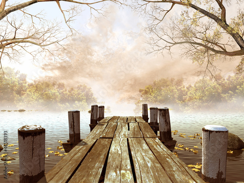 Jesienna sceneria z drewnianym molo na jeziorze