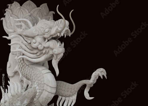 Dragon statue isolate on the black background