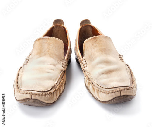 Pair of brown male loafers isolated on white