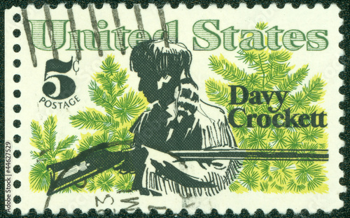 stamp shows Davy Crockett and Scrub Pines