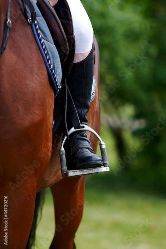 Foot of the athlete in a stirrup