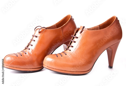 two brown womanish boot