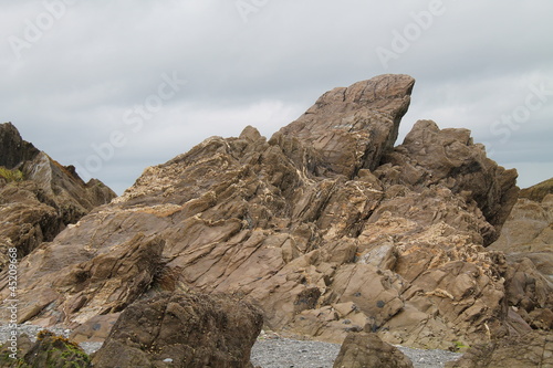 A Dramatic Rocky Outcrop on a Coastal Beach.