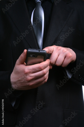 Businessman using mobile phone