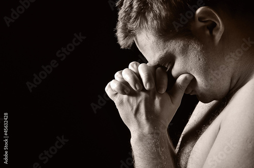 Praying man.