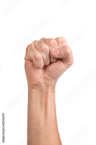 Males hand with a clenched fist isolated