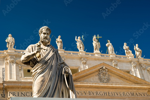 Statue of Peter the Apostle and St Peter's Basilica, Vatican, Rome, Italy