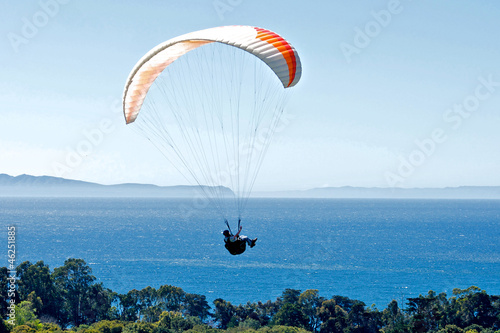 Paraglider above the Pacific Ocean