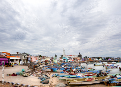 Kanyakumari, India. Dozens of fishing boats moored in the sand