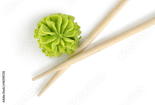 Wooden chopsticks and wasabi isolated