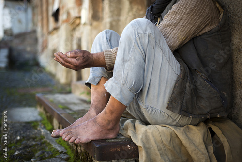 Beggar is begging for food on the street