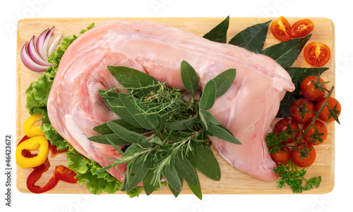 Coniglio intero - whole rabbit on wooden board