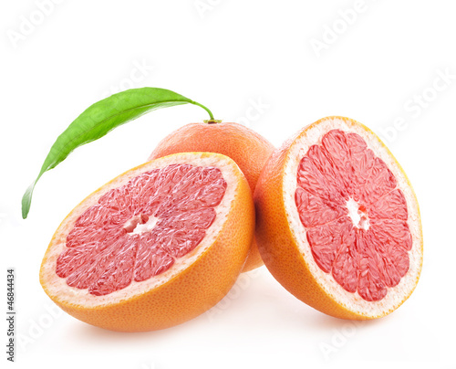 Grapefruit with leaves isolated on white background