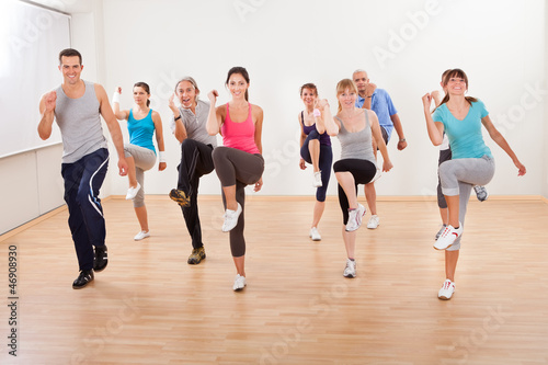 Group of people doing aerobics exercises