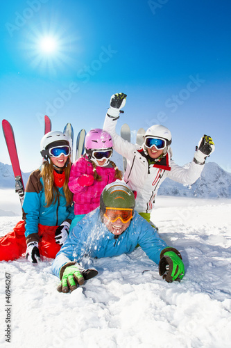 Ski, snow, sun and winter fun - happy family ski team