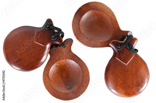 Two pair castanets on a white background