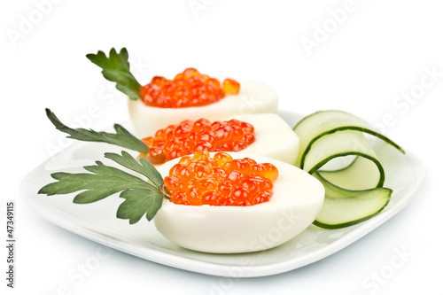 three eggs stuffed with caviar